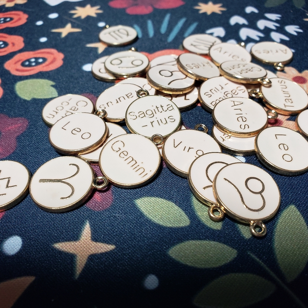 Mixed lot metal zodiac pendants